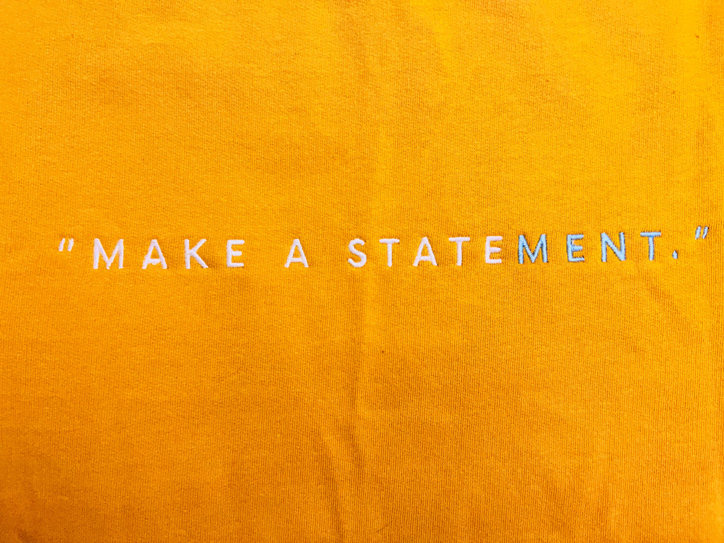 “MAKE A STATEMENT.” Unisex Crewneck Sweatshirt